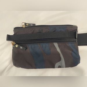 The ANDI Urban Clutch in black camo